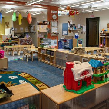 Young Preschool Classroom, showing circle area, art area, and quiet area. 